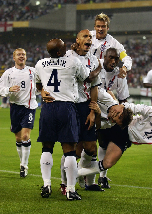 Rio Ferdinand celebrates his goal against Denmark in 2002.
